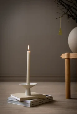 Uma ljusstake, Sand